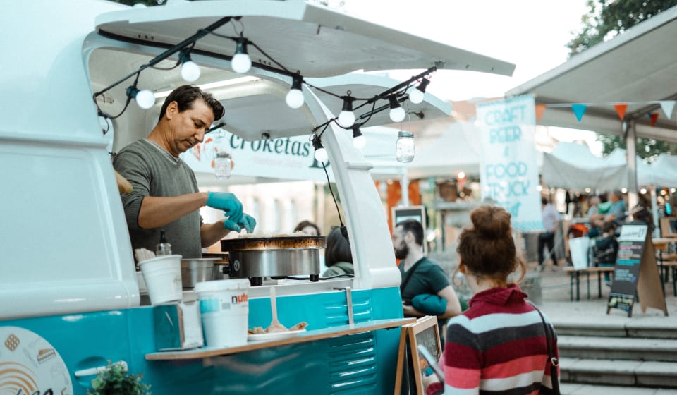 Customer ordering at a food truck