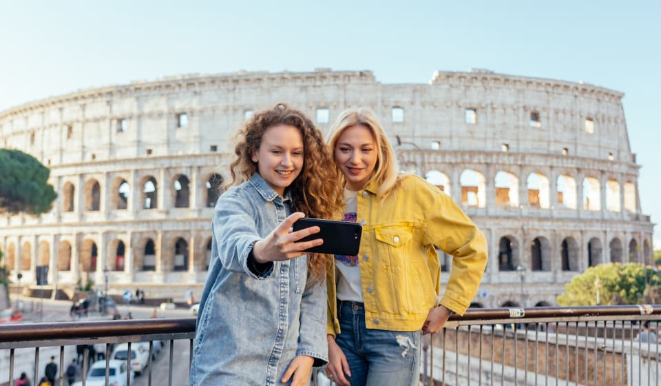 Two tourist making a selfie at the Colosseum