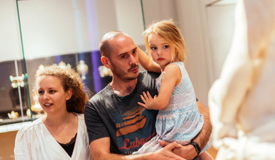 A family in a museum