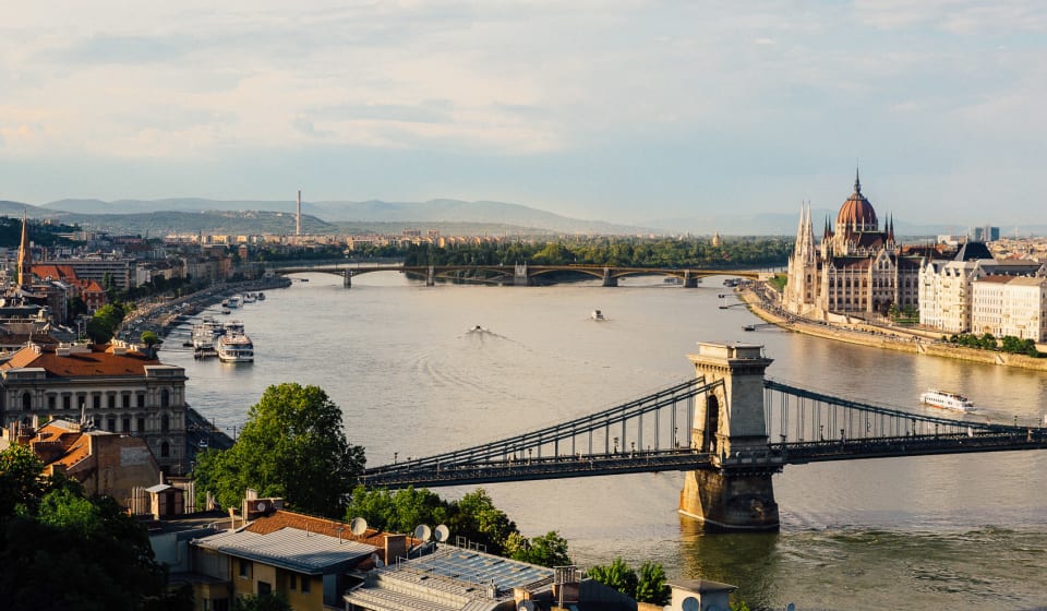 Have a long walk on the river bank of Danube in the evening