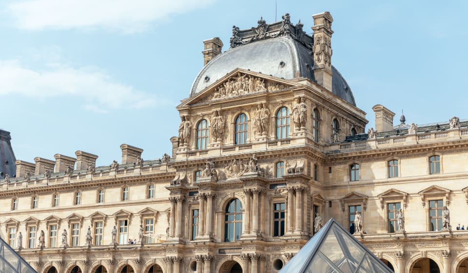 A view on the Louvre from the outside and the pyramids