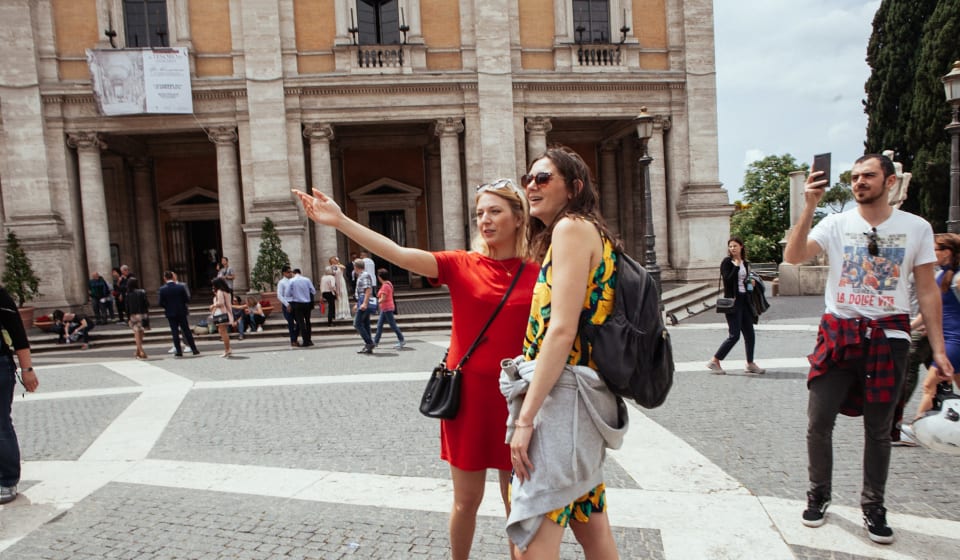 A local guide showing a tourist sights on a day trip just outside of Rome