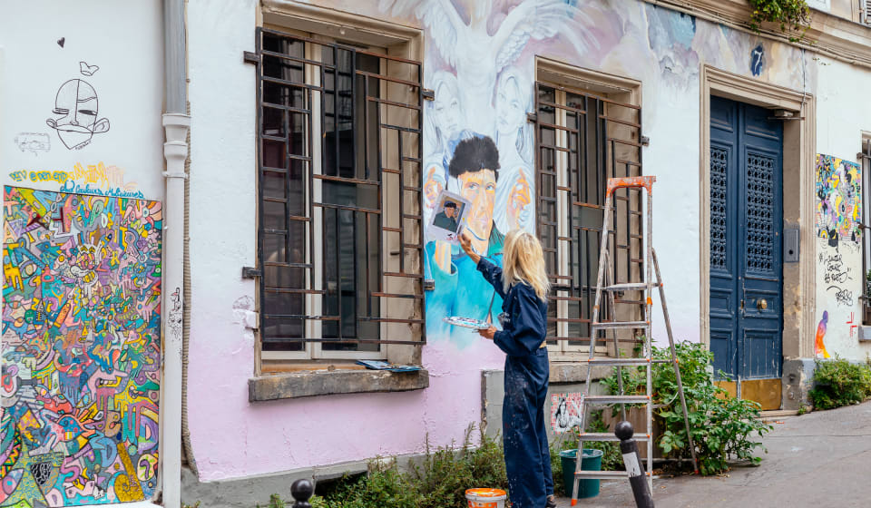 An artist making a murial of Vincent van Gogh in Montmartre