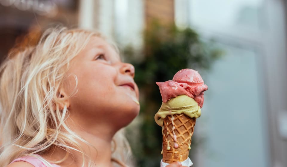 Child eating gelato in Rome