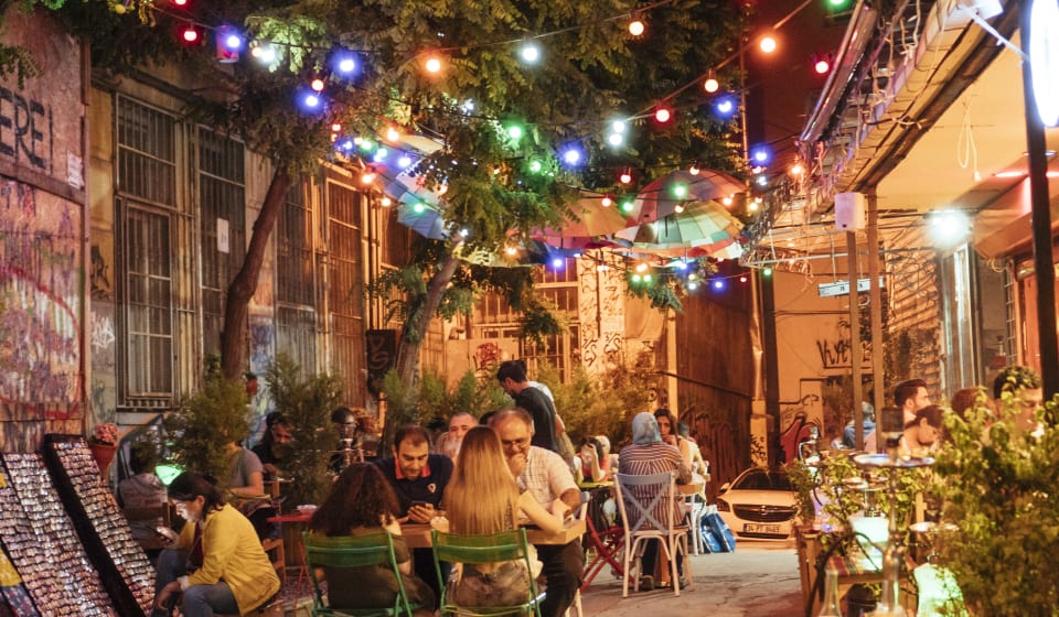 A view on a terrace with colorful lights at a Turkish restaurant bar in Istanbul