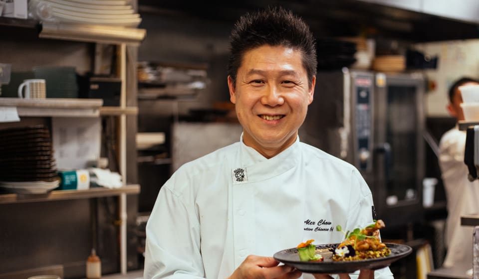 A chef showing food in London