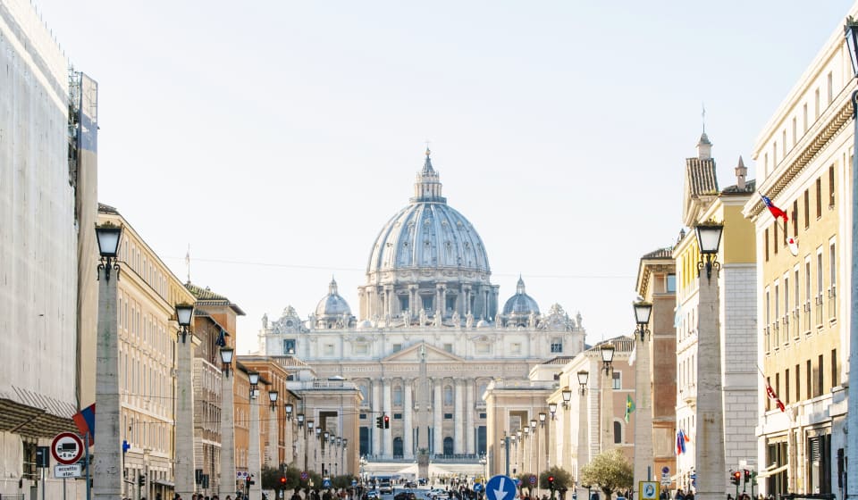 A street in Rome with the Vatican in the background