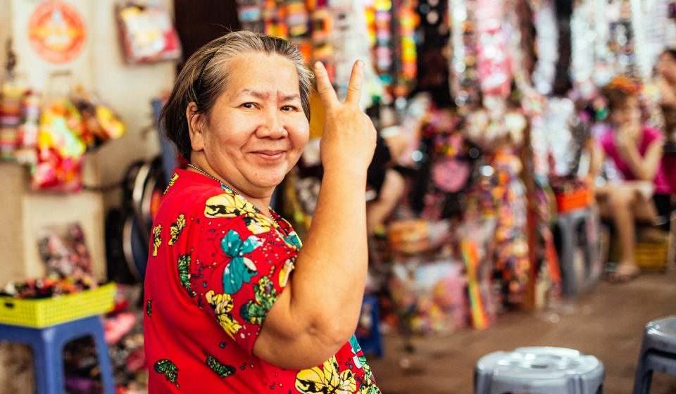 A Vietnamese local posing for the picture on the streets of Ho Chi Minh City