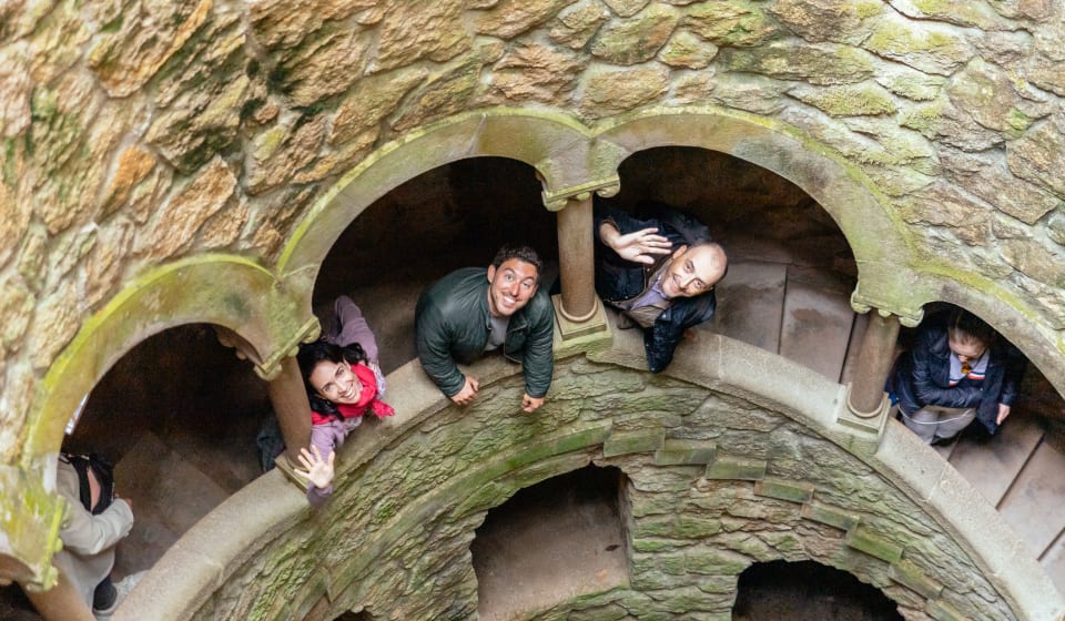 A picture of people on the stairway of the Initiation Well in Sintra
