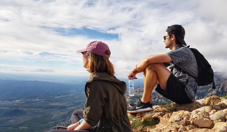 Two tourists enjoying the view on Montserrat