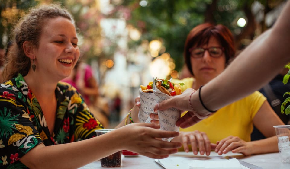 A tourists gets some Greek Gyros