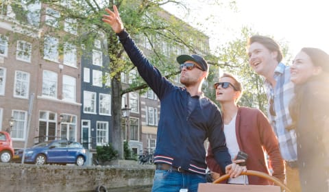 A group of tourists on a boat in Amsterdam