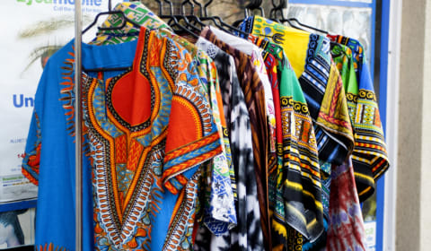 African styled colorful clothes on a rack