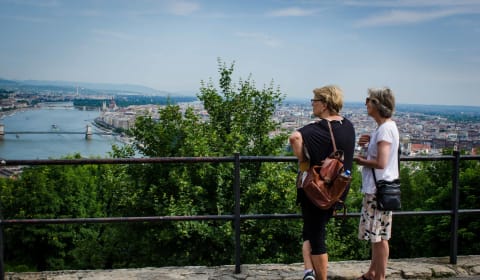 Two woman having a view on the Danube river in Budapest from a mountain