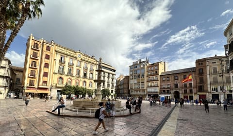 A view on a square and fountain in Malaga