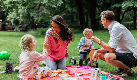 A family having a picnic in the Vondelpark, Amsterdam