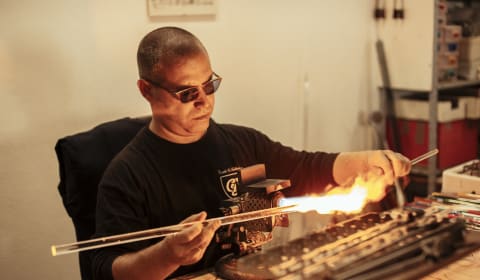 A local artisan in Venice making art from glass