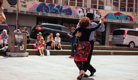 Two locals dancing Forro on the streets of Porto
