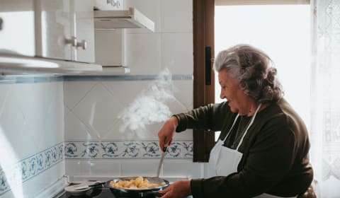 A local making food for a home dinner in Madrid