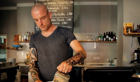 Barista making coffee