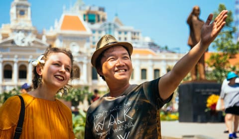 A local guide in Ho Chi Minh city showing a local the highlights of the city