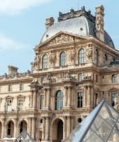 A view on the Louvre from the outside and the pyramids