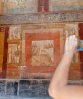 A wall with a fresco in Pompeii
