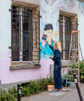 An artist making a murial of Vincent van Gogh in Montmartre