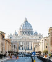 A street in Rome with the Vatican in the background