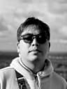 Portrait from local Hoàng - The Curious Creator: BJJ Explorer, Storytelling Photographer, Part-Time Crooner & Full-Time Cat Enthusiast