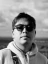 Portrait from local Hoàng - The Curious Creator: BJJ Explorer, Storytelling Photographer, Part-Time Crooner & Full-Time Cat Enthusiast