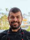 Portrait from local Michail - Chef of Greek cuisine