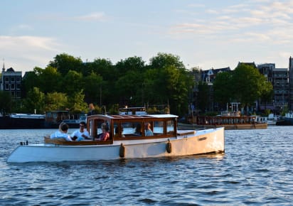 Secret Amsterdam Boat Tour: Off the Beaten Canals in Amsterdam - 87ce408ef0b9122215ac53afe424c307